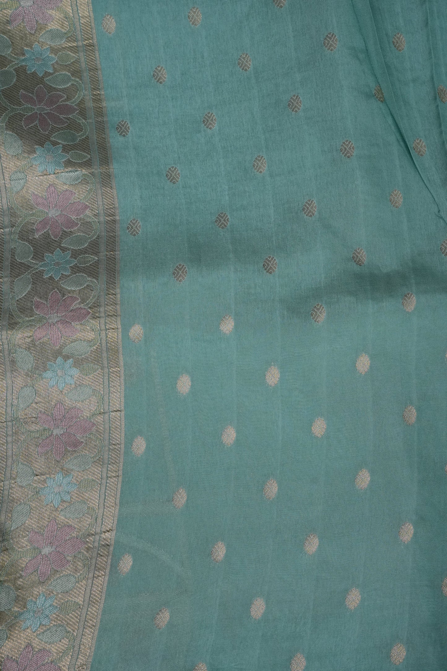 Sea Green Woven Floral Tussar Georgette Saree with Zari Border