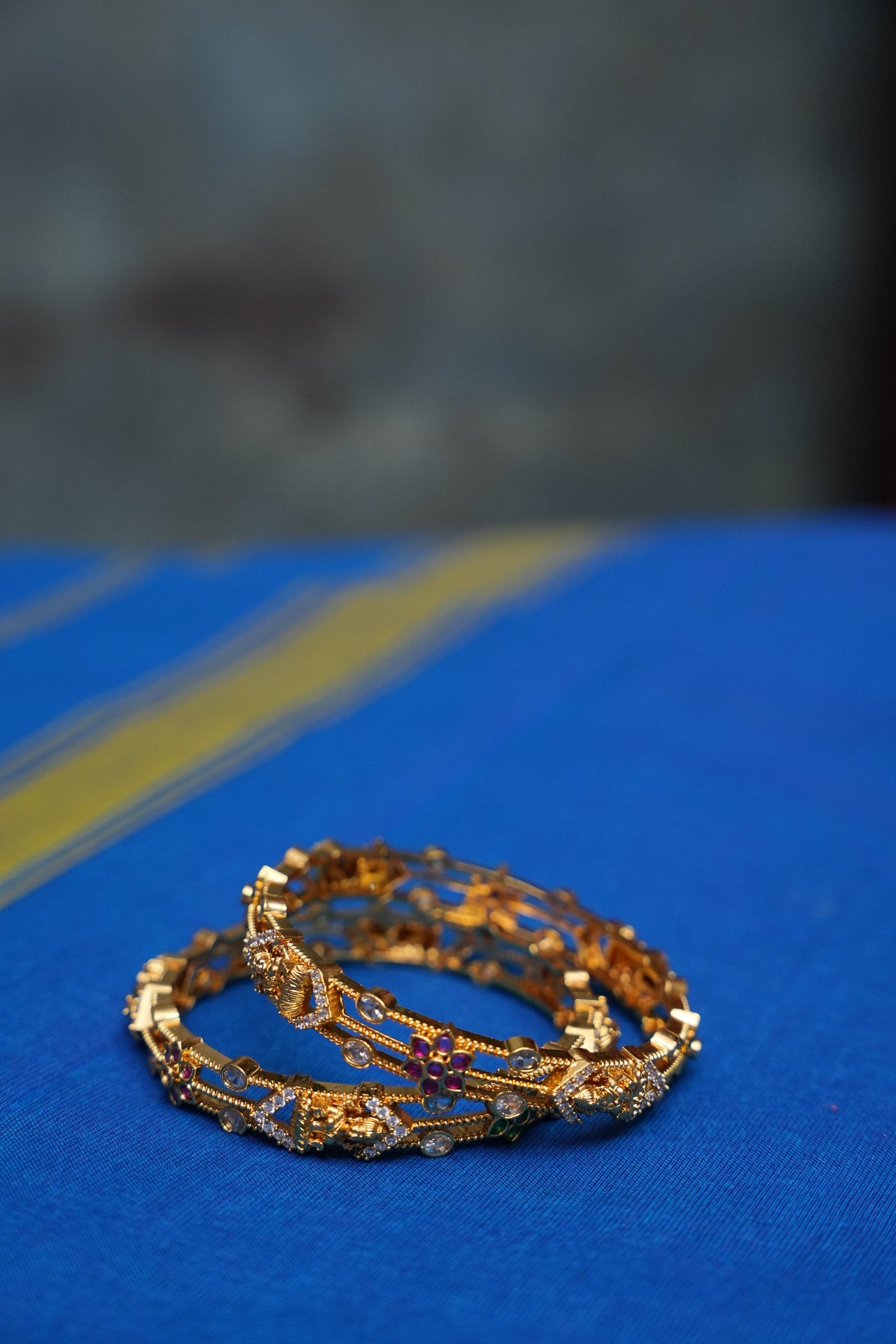 Premium Gold-Plated Temple Design Bangles – White, Ruby & Emerald Stones | Set of 2