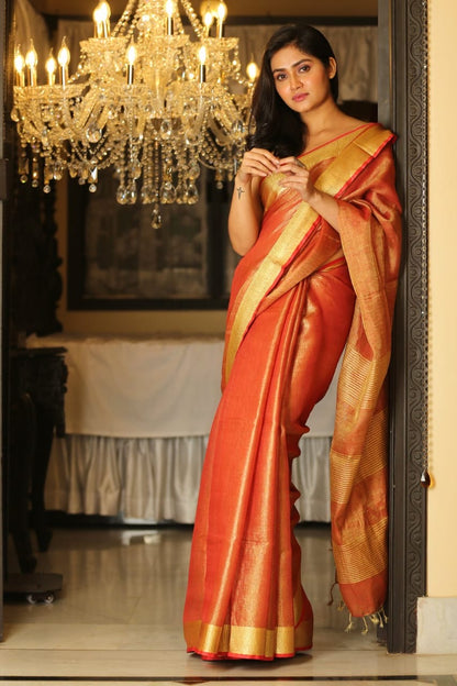 Tissue Linen Silk Saree – Coral Peach with Classic Gold Zari Border