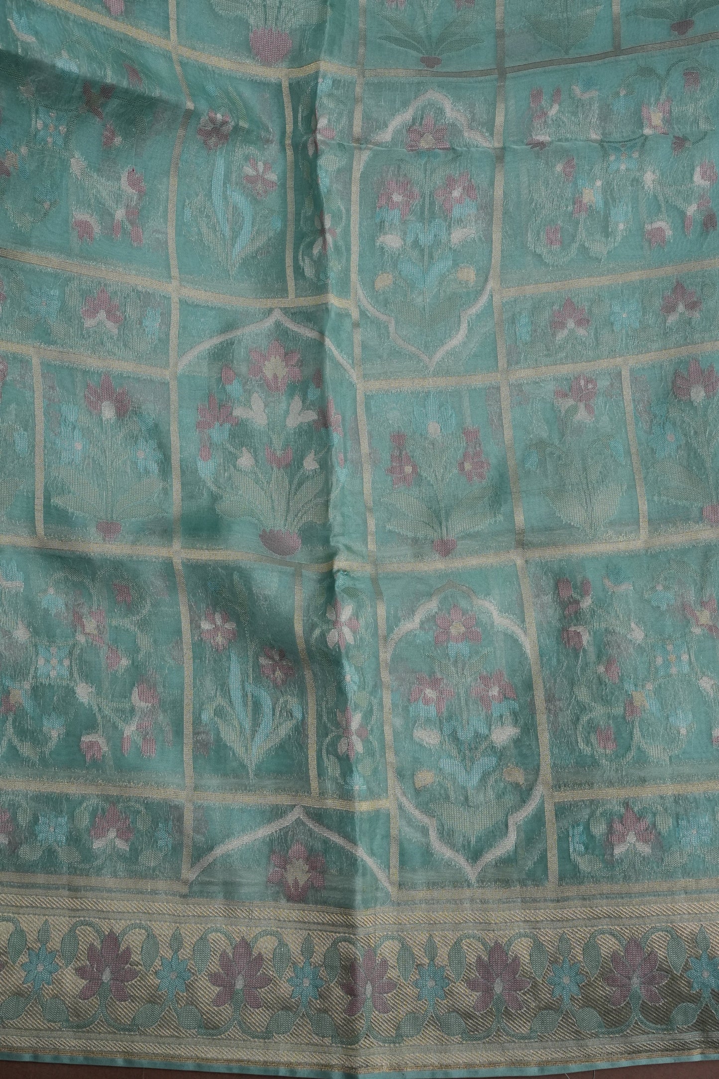 Sea Green Woven Floral Tussar Georgette Saree with Zari Border