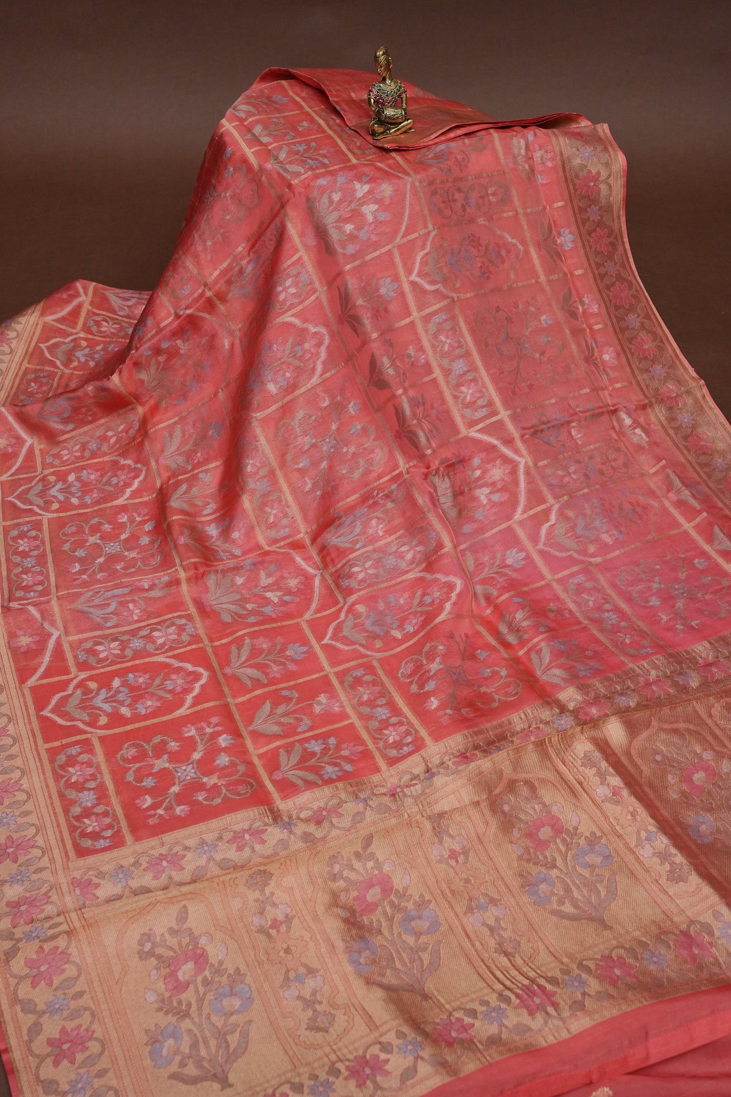 Coral Pink Woven Floral Tussar Georgette Saree with Zari Border