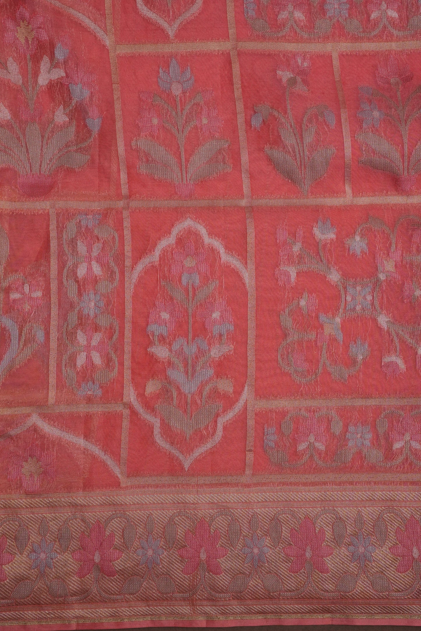 Coral Pink Woven Floral Tussar Georgette Saree with Zari Border