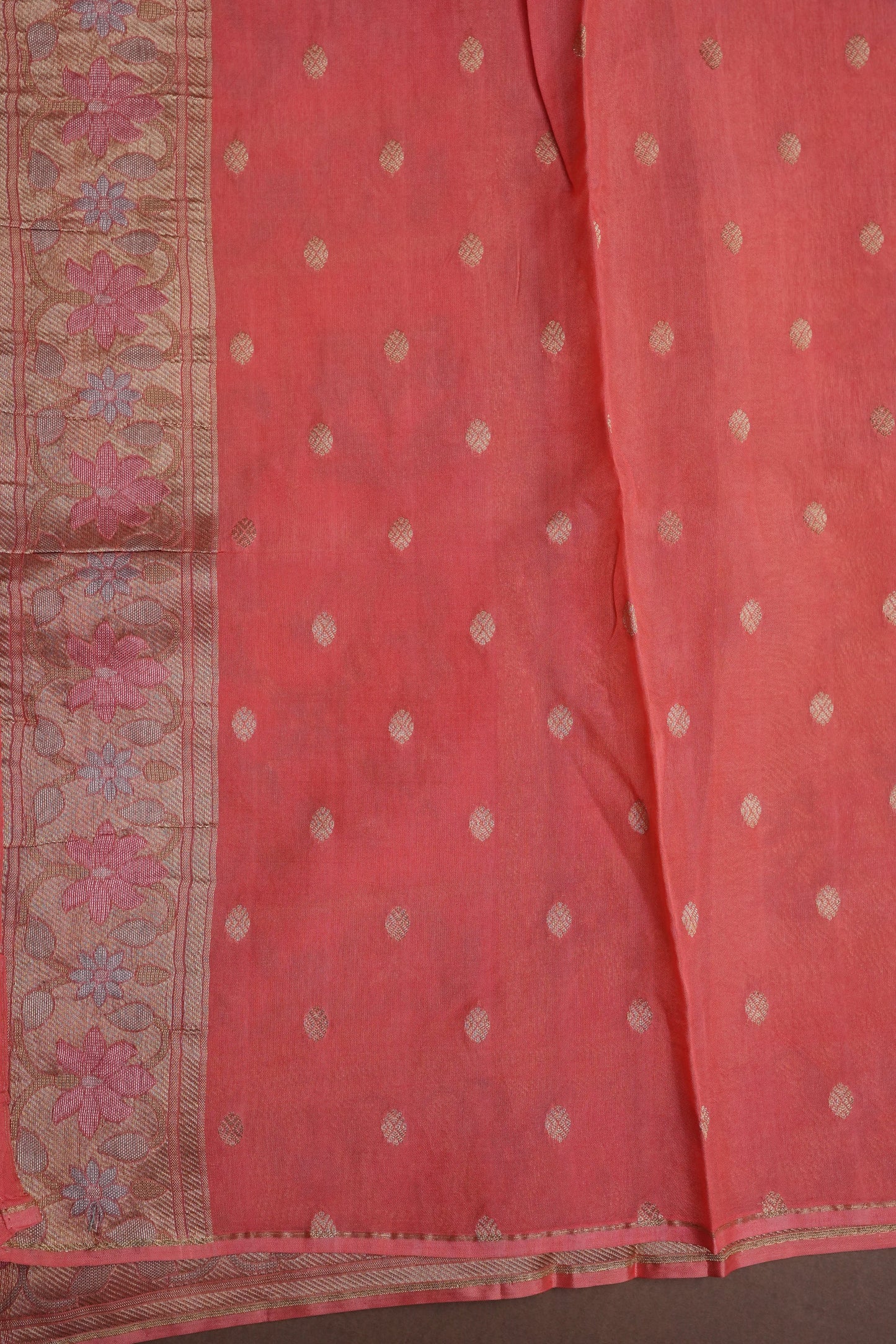 Coral Pink Woven Floral Tussar Georgette Saree with Zari Border