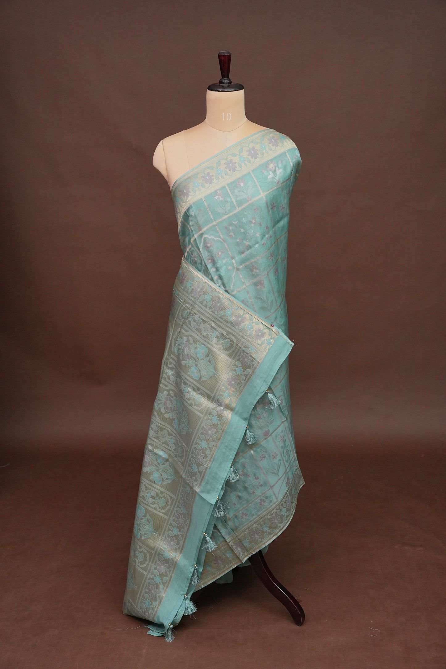 Sea Green Woven Floral Tussar Georgette Saree with Zari Border