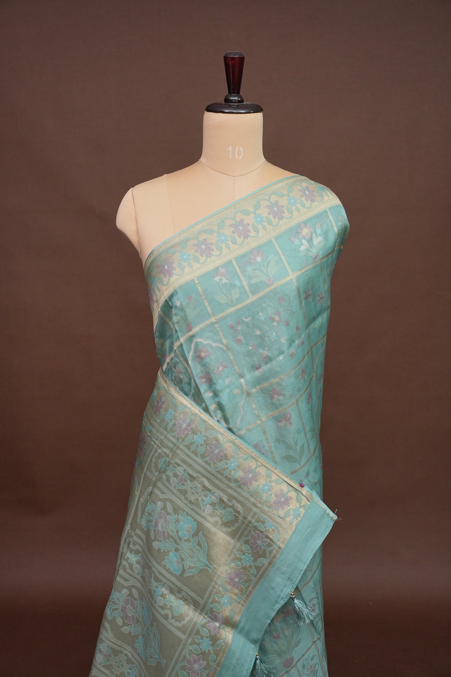 Sea Green Woven Floral Tussar Georgette Saree with Zari Border