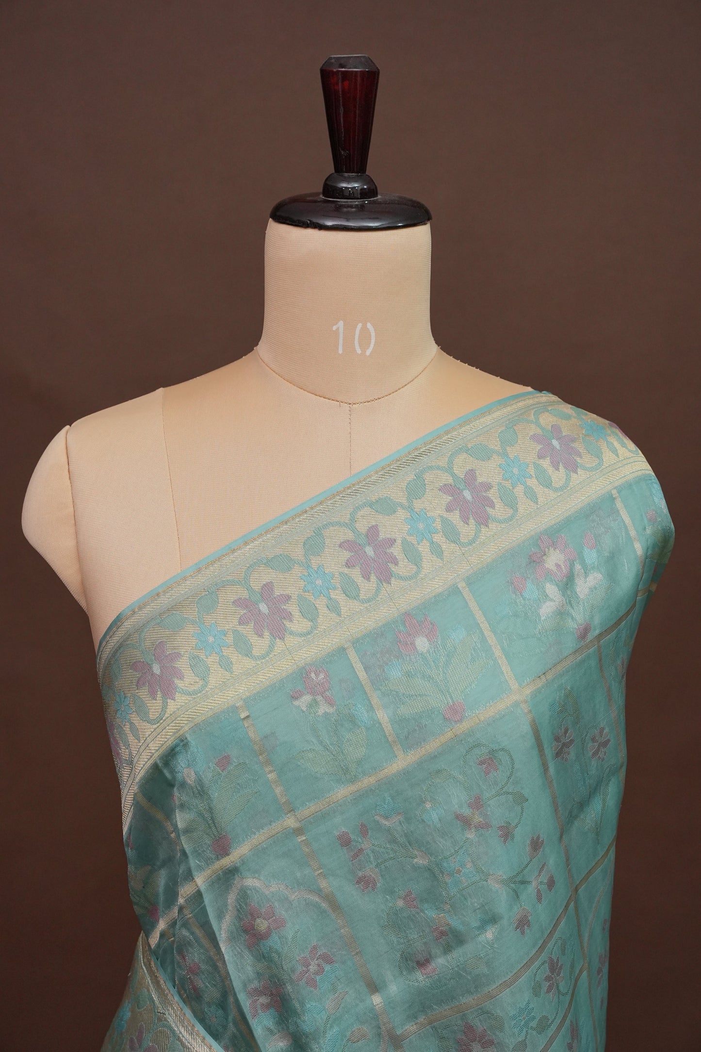 Sea Green Woven Floral Tussar Georgette Saree with Zari Border