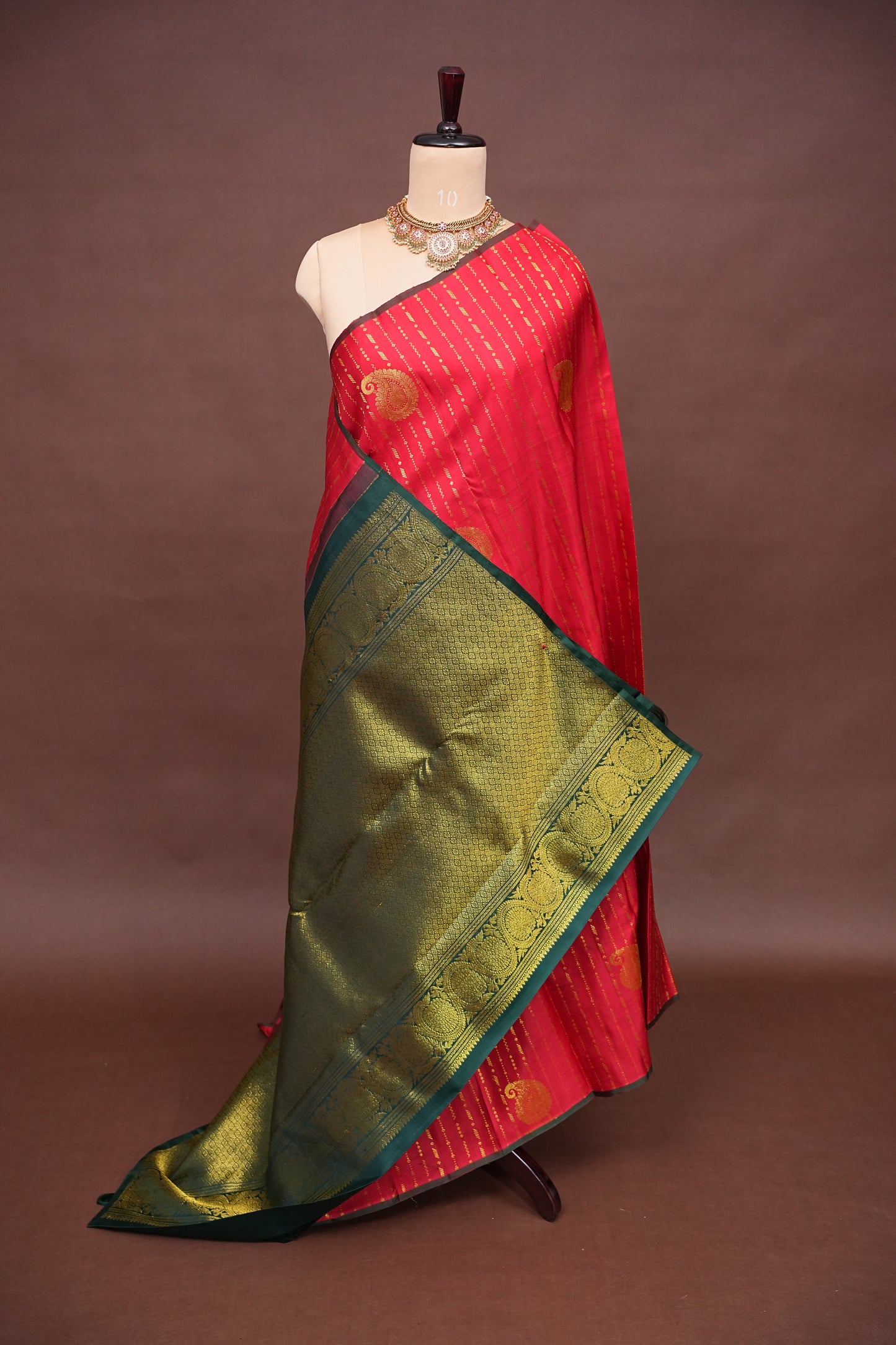 Red Borderless Pure Kanchipuram Silk Saree with Green Zari Pallu & Traditional Motifs