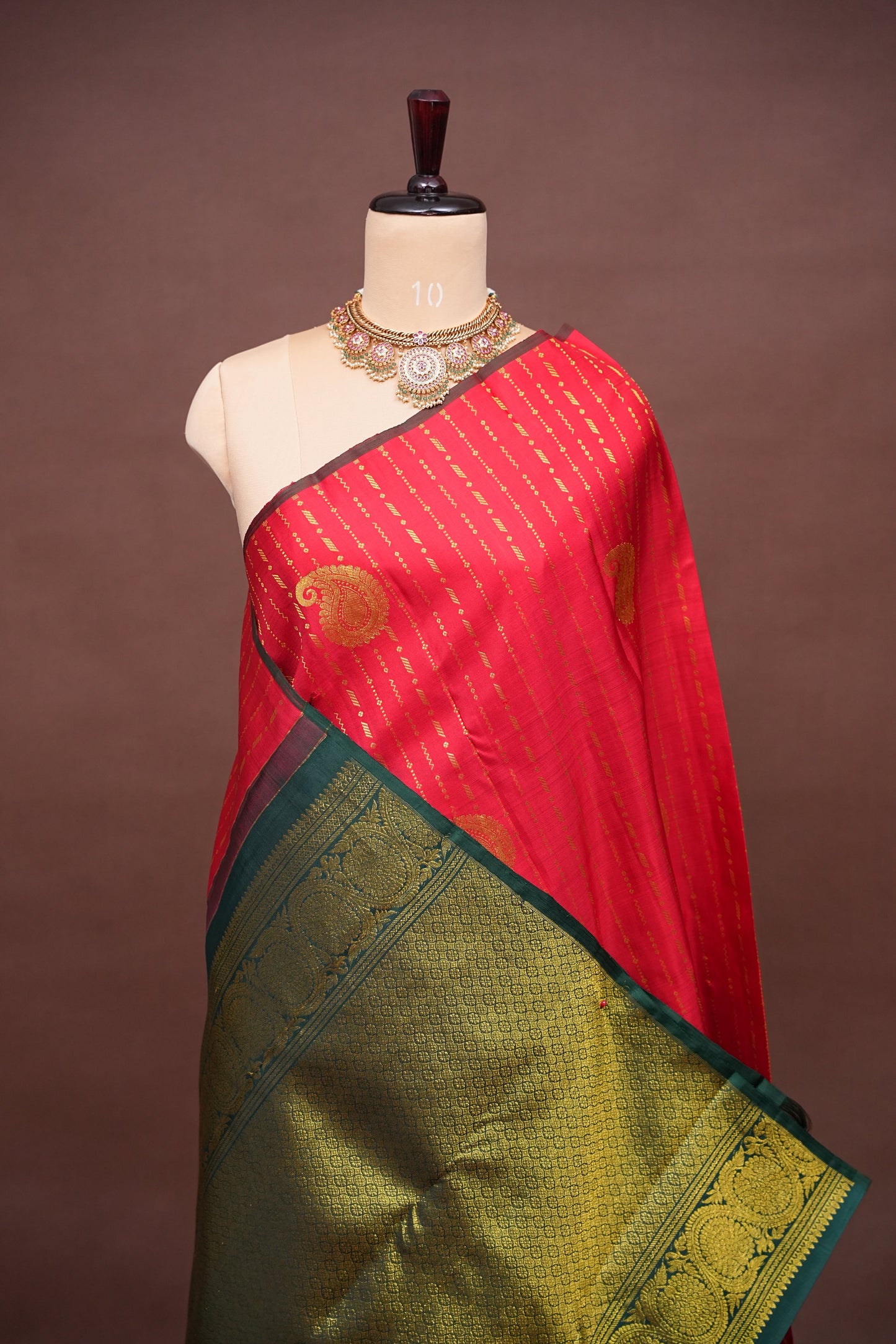 Red Borderless Pure Kanchipuram Silk Saree with Green Zari Pallu & Traditional Motifs