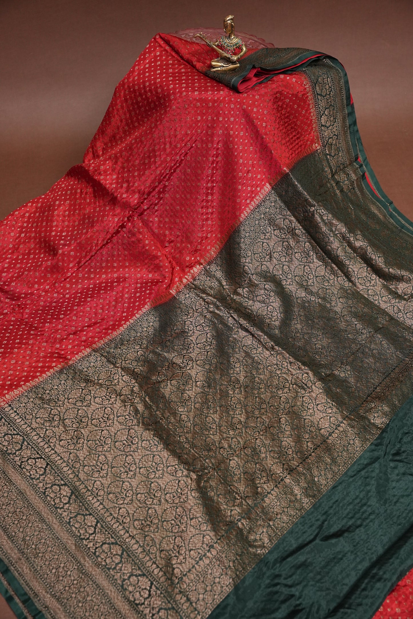 Khaddi Georgette Crepe Silk Saree with Antique Border – Red & Bottle Green