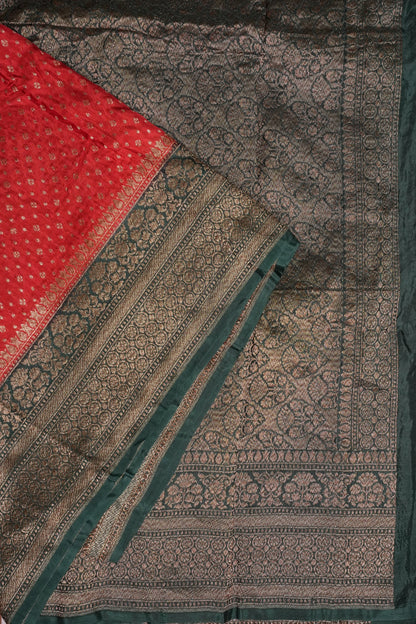 Khaddi Georgette Crepe Silk Saree with Antique Border – Red & Bottle Green