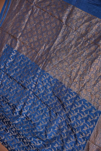 Khaddi Georgette Crepe Silk Saree with Antique Border – Peacock Blue