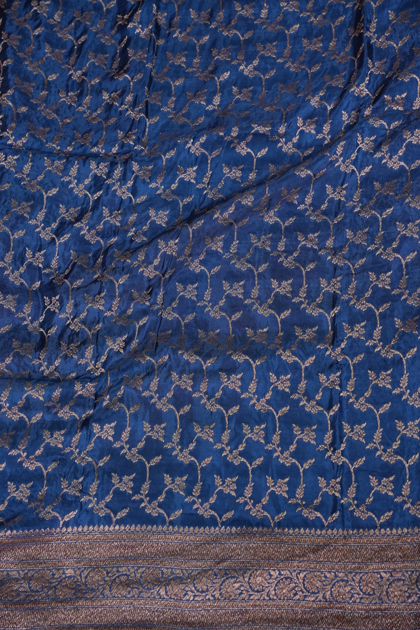 Khaddi Georgette Crepe Silk Saree with Antique Border – Peacock Blue