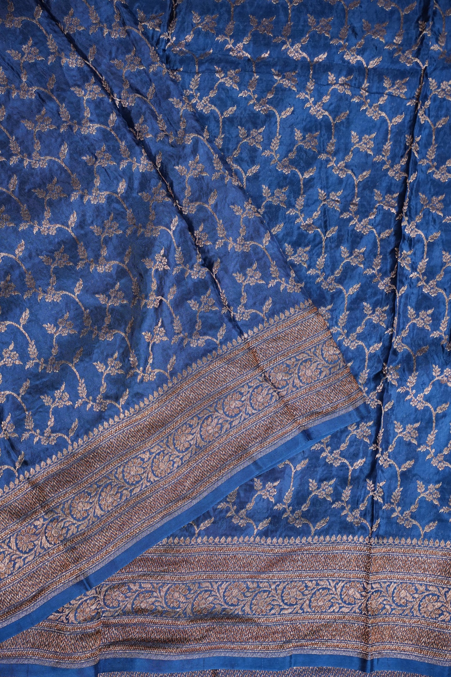 Khaddi Georgette Crepe Silk Saree with Antique Border – Peacock Blue