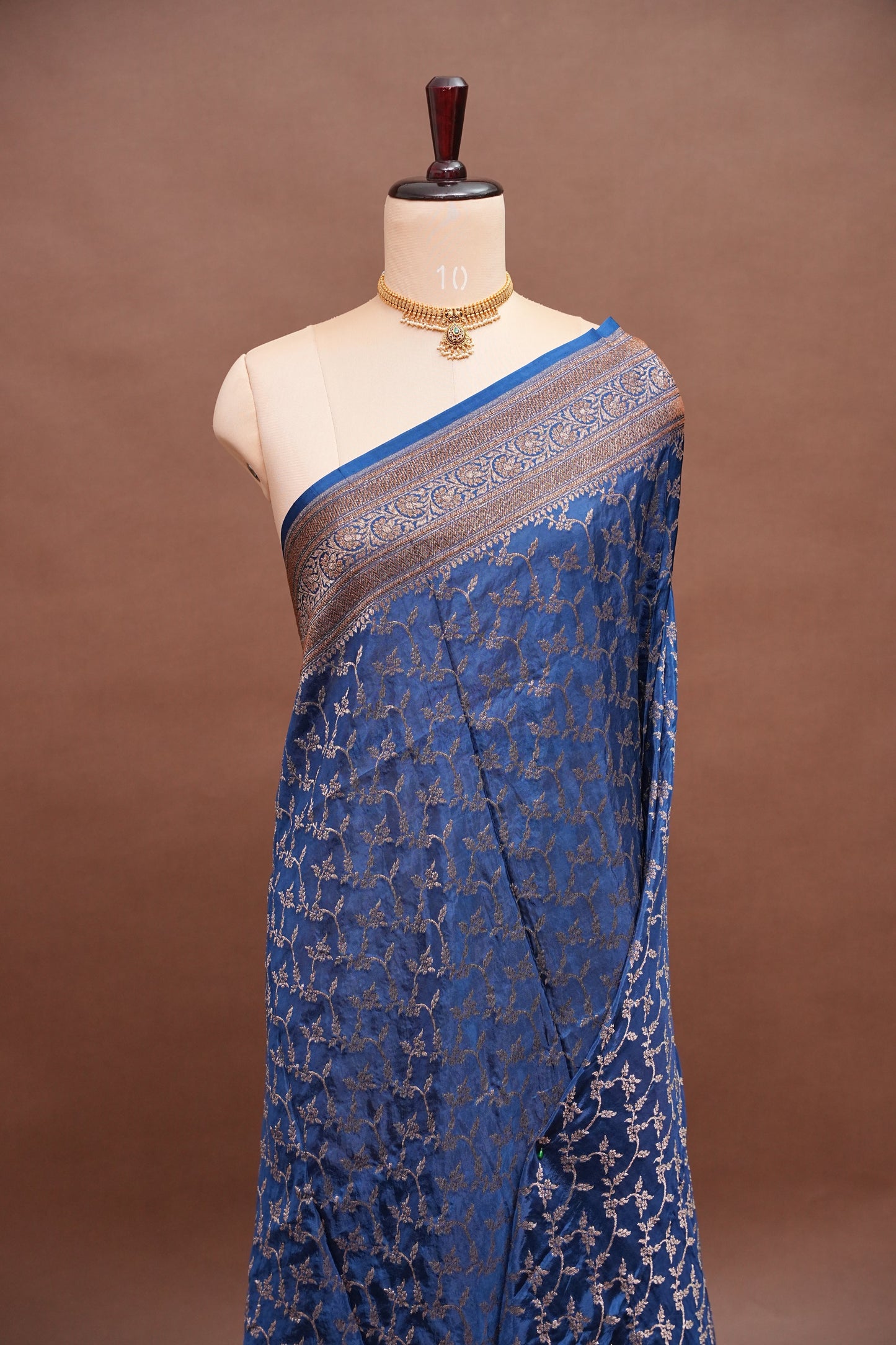 Khaddi Georgette Crepe Silk Saree with Antique Border – Peacock Blue