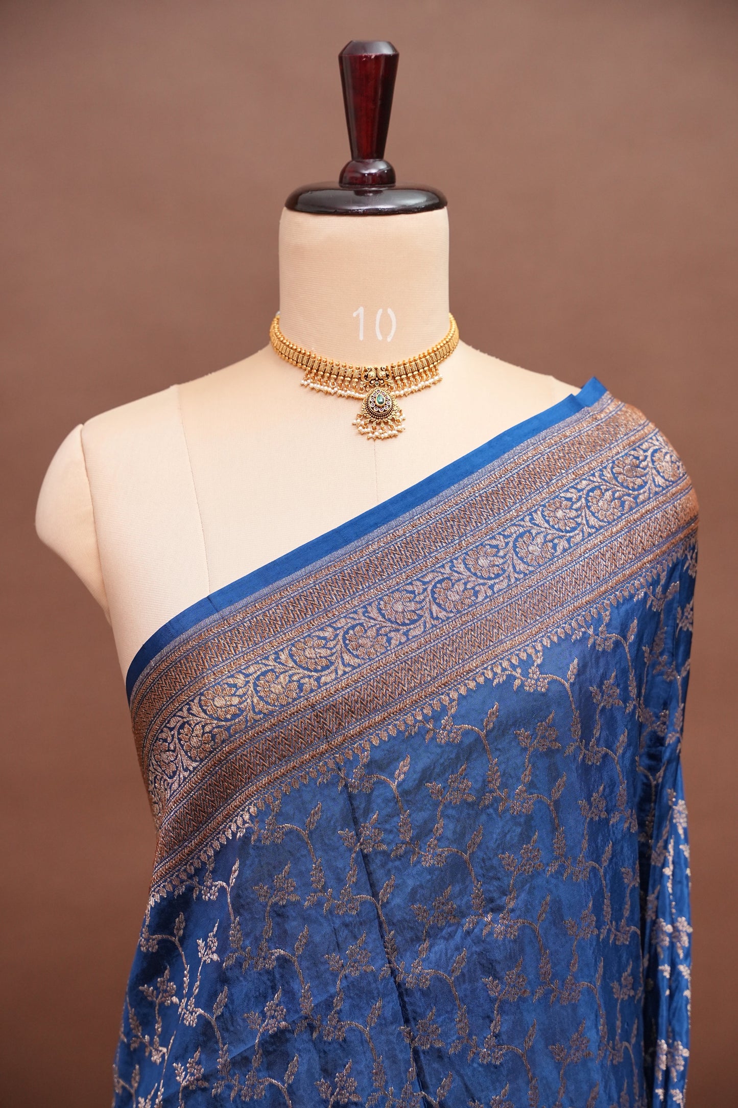 Khaddi Georgette Crepe Silk Saree with Antique Border – Peacock Blue