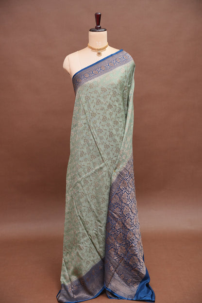 Khaddi Georgette Crepe Silk Saree with Antique Border – Blue Grey & Peacock Blue