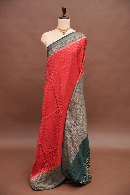 Khaddi Georgette Crepe Silk Saree with Antique Border – Red & Bottle Green
