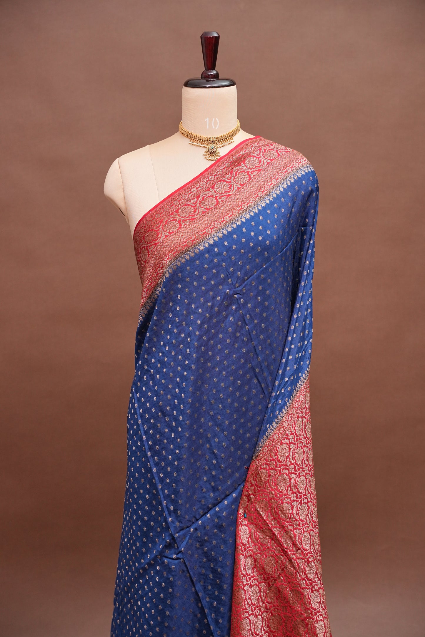 Khaddi Georgette Crepe Silk Saree with Antique Border – Peacock Blue & Red