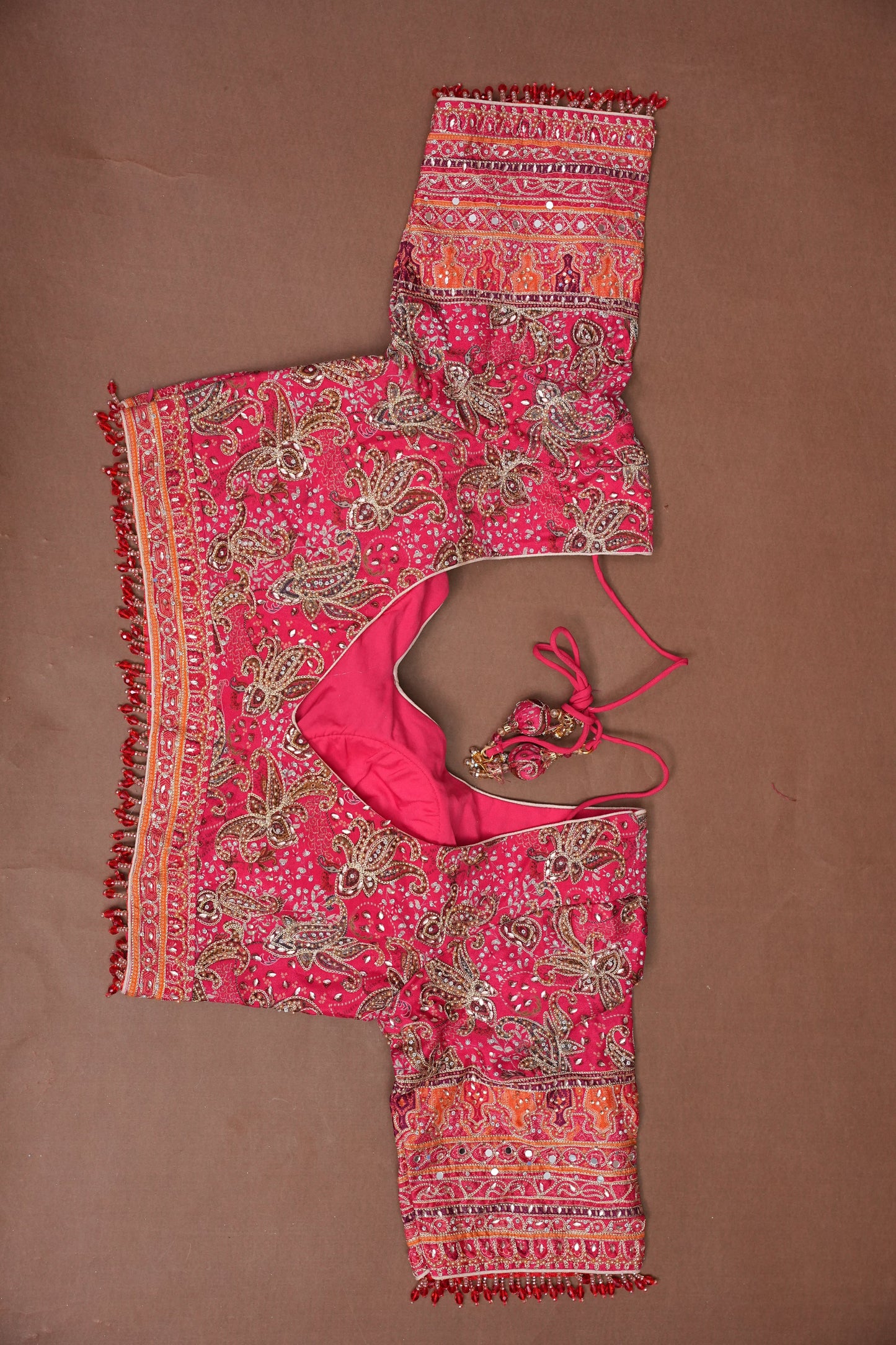 Rani Pink Designer Party Wear Saree with Intricate Paisley Embellishments