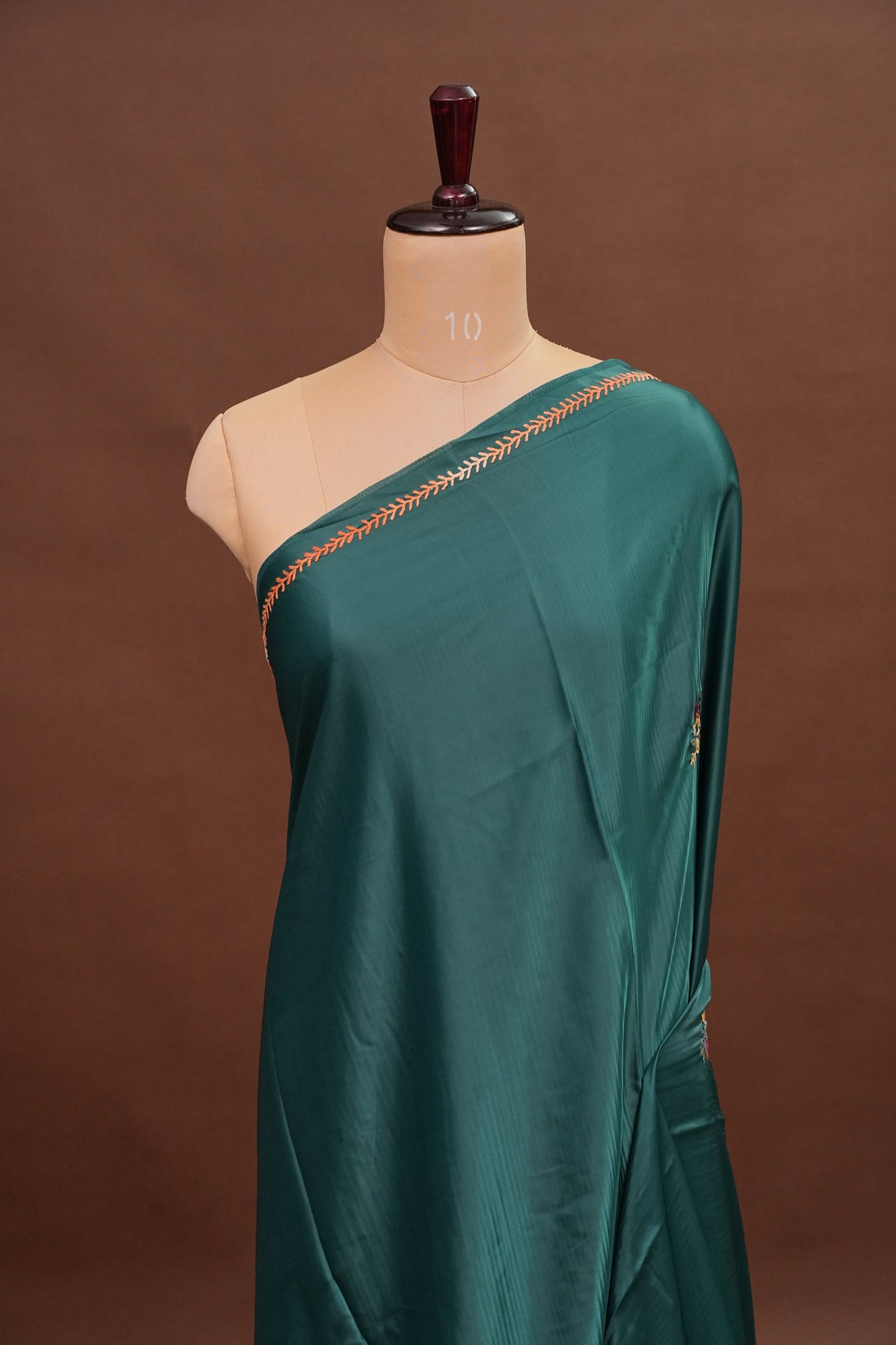 Deep Teal Green Crepe silk saree with French knot work
