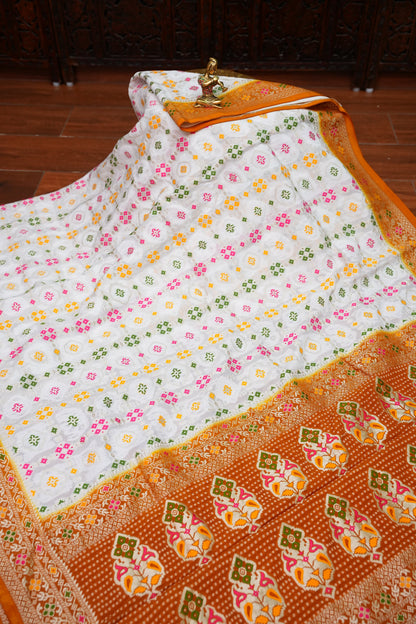 Heavy Georgette Banarasi Saree with Geometric Jaal Weaving – White & Mustard