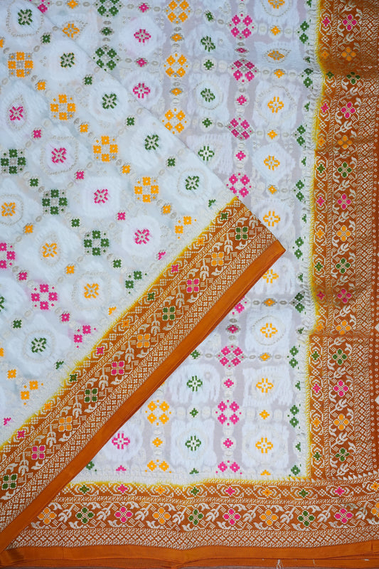 Heavy Georgette Banarasi Saree with Geometric Jaal Weaving – White & Mustard