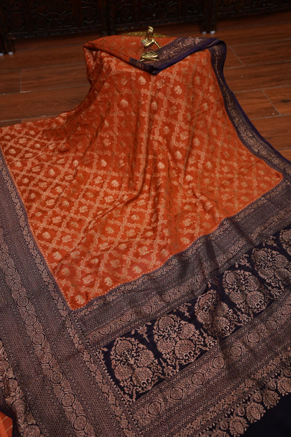 Banarasi Tussar Georgette Saree with Geometric Jaal Weave – Rust & Aubergine Purple