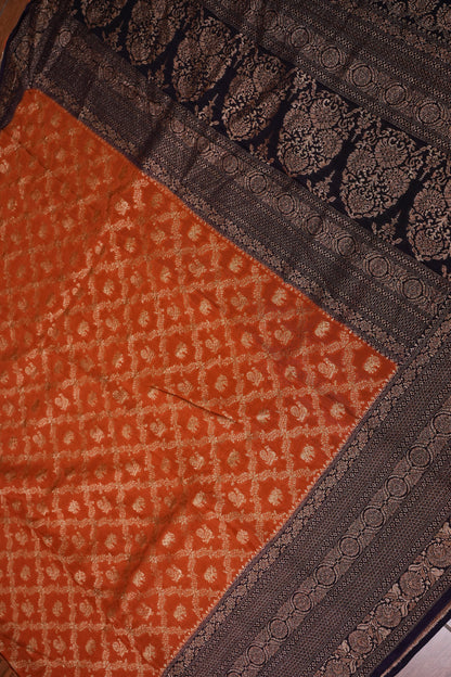 Banarasi Tussar Georgette Saree with Geometric Jaal Weave – Rust & Aubergine Purple