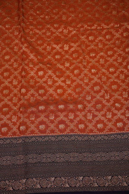 Banarasi Tussar Georgette Saree with Geometric Jaal Weave – Rust & Aubergine Purple