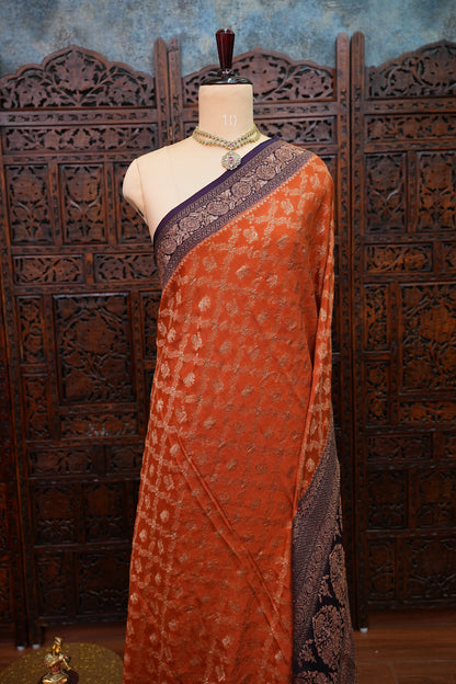 Banarasi Tussar Georgette Saree with Geometric Jaal Weave – Rust & Aubergine Purple