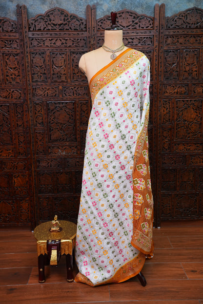 Heavy Georgette Banarasi Saree with Geometric Jaal Weaving – White & Mustard