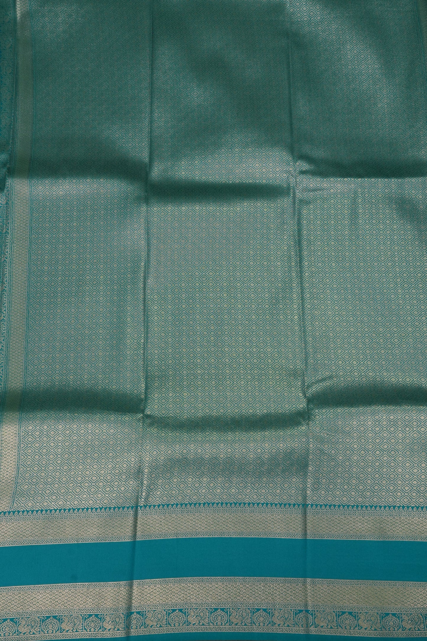 Lime Green Semi Silk Saree with Aqua Blue Silver Zari Border