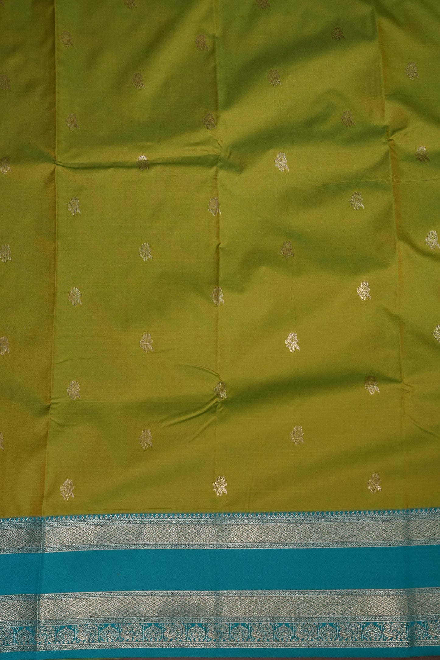 Lime Green Semi Silk Saree with Aqua Blue Silver Zari Border