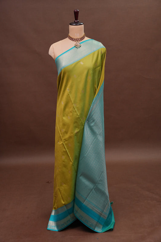 Lime Green Semi Silk Saree with Aqua Blue Silver Zari Border