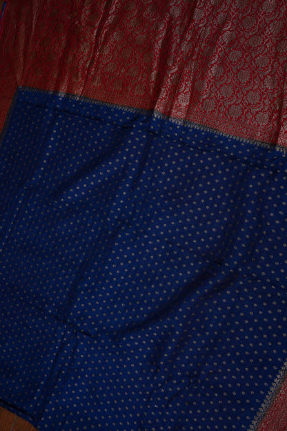 Khaddi Georgette Crepe Silk Saree with Antique Border – Peacock Blue & Red