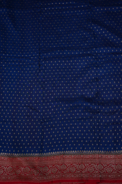 Khaddi Georgette Crepe Silk Saree with Antique Border – Peacock Blue & Red