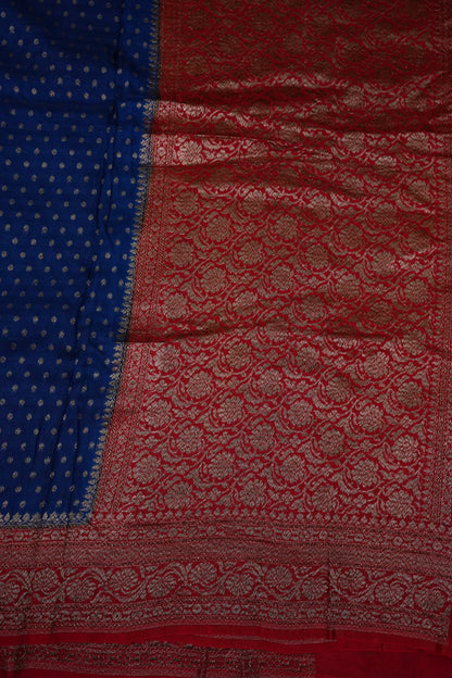 Khaddi Georgette Crepe Silk Saree with Antique Border – Peacock Blue & Red