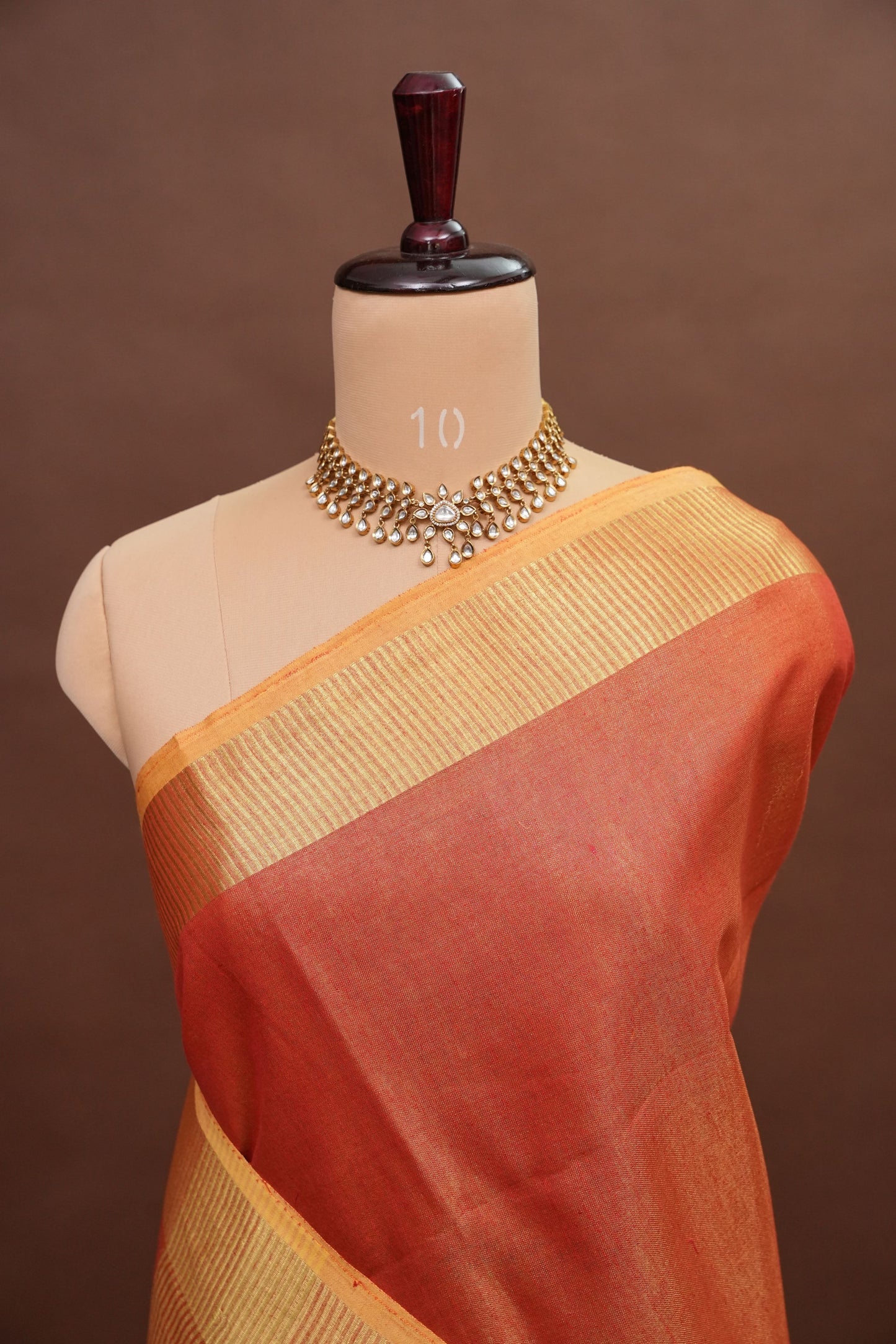 Tissue Linen Silk Saree – Coral Peach with Classic Gold Zari Border