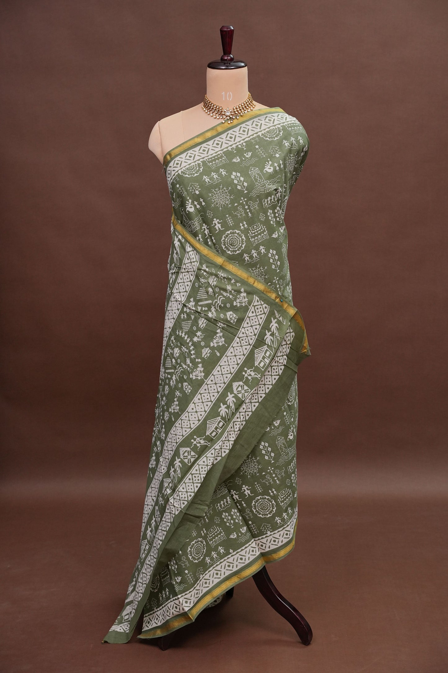 Earthy Elegance Handloom cotton Saree – Olive Green with Tribal Motifs