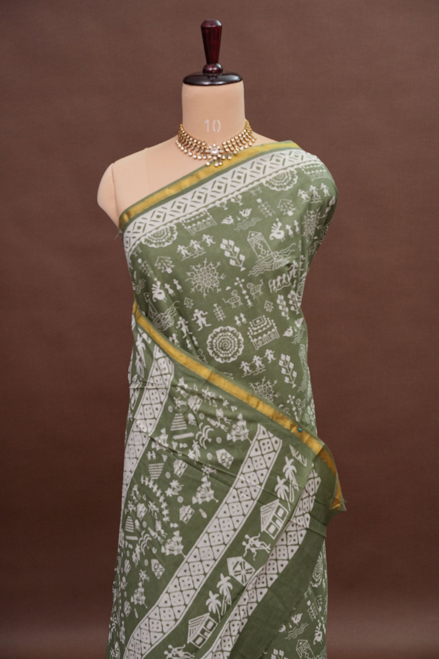 Earthy Elegance Handloom cotton Saree – Olive Green with Tribal Motifs