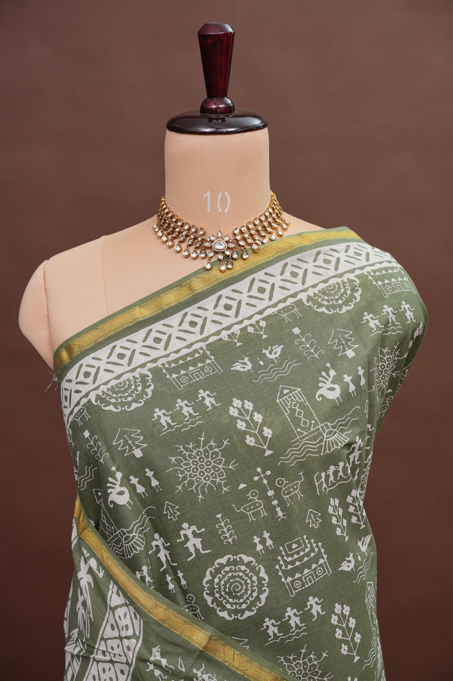 Earthy Elegance Handloom cotton Saree – Olive Green with Tribal Motifs