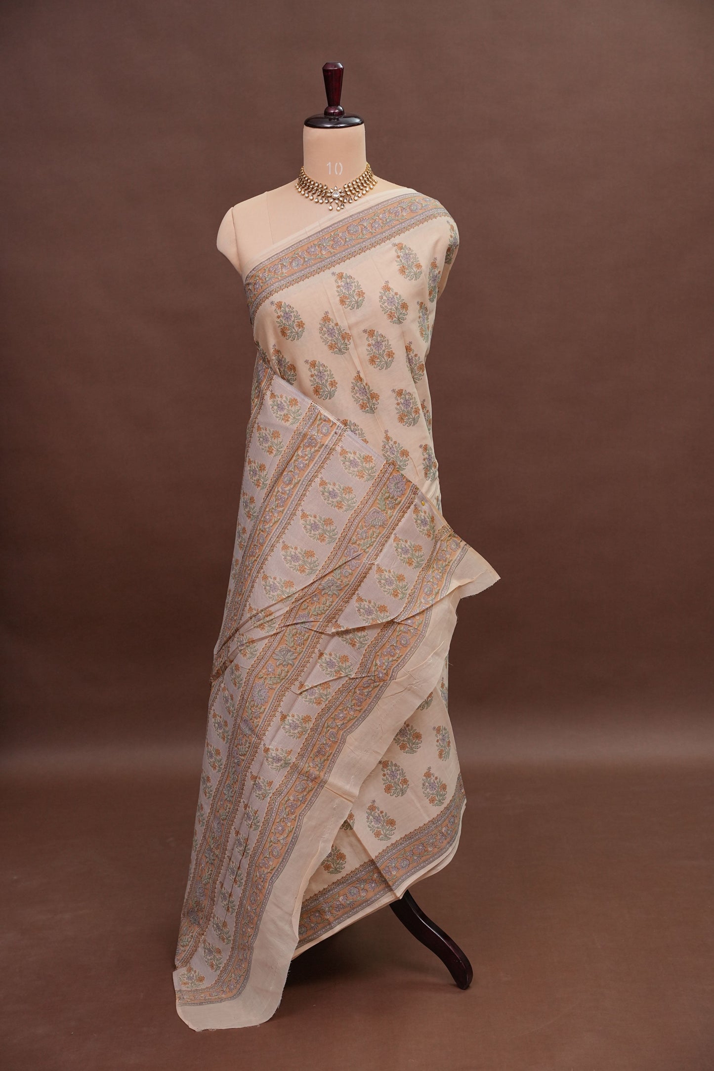 Elegant Pastel Floral cotton Saree – Soft Ivory with Multicolor Woven Buttas