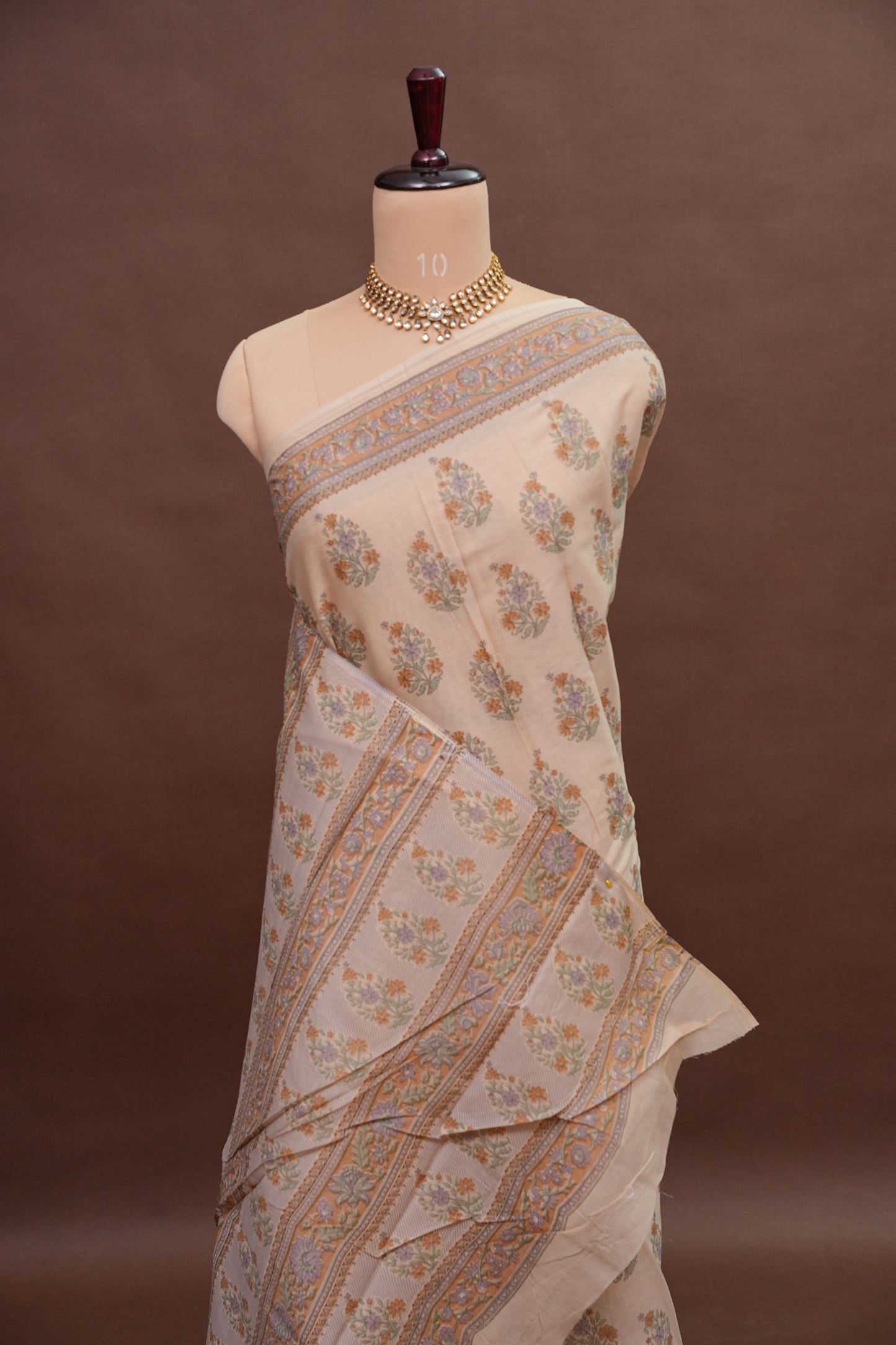 Elegant Pastel Floral cotton Saree – Soft Ivory with Multicolor Woven Buttas