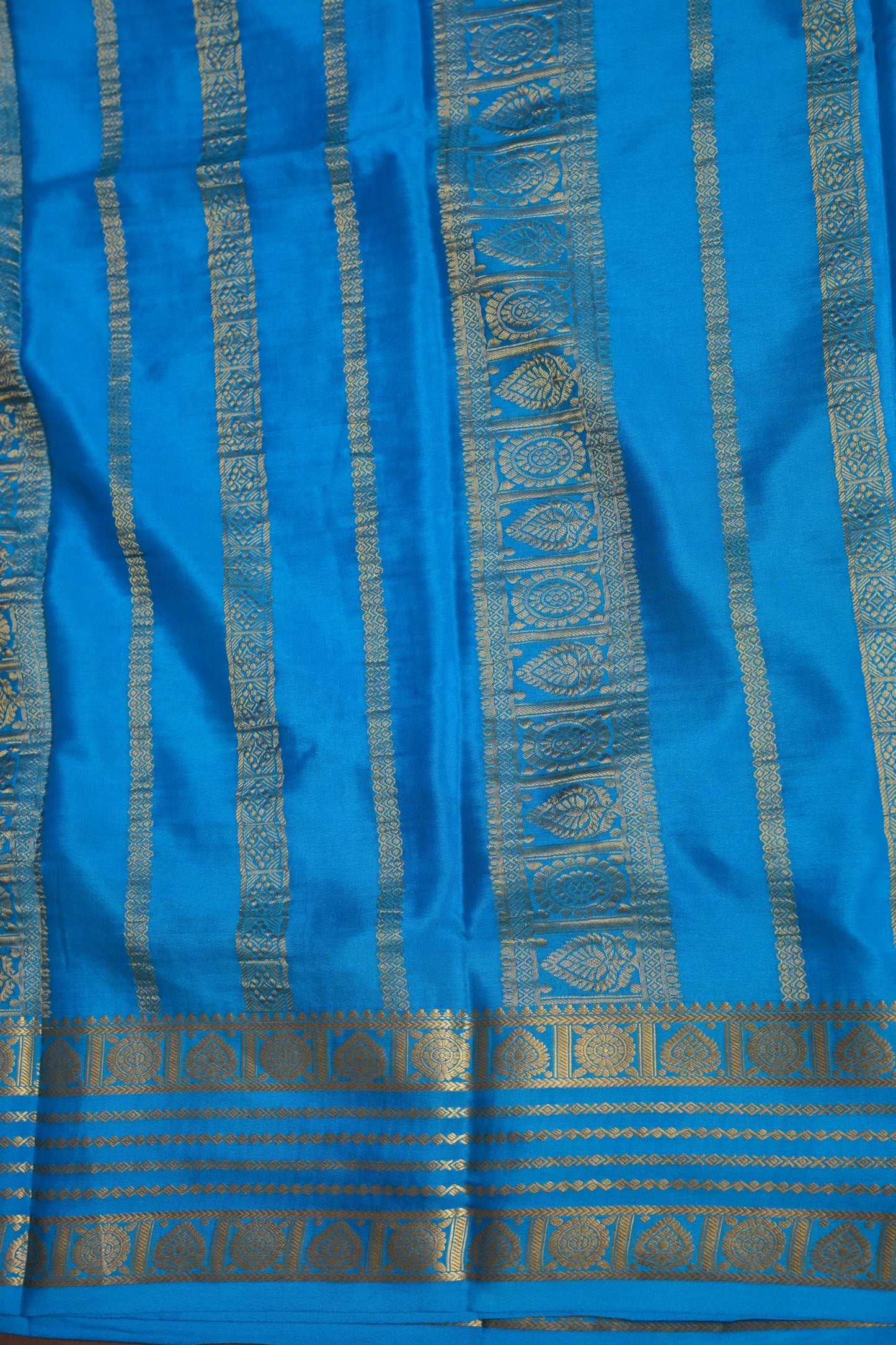 Pure Crepe Mysore Silk Saree in Ink Blue With Contrast Sky Blue Border