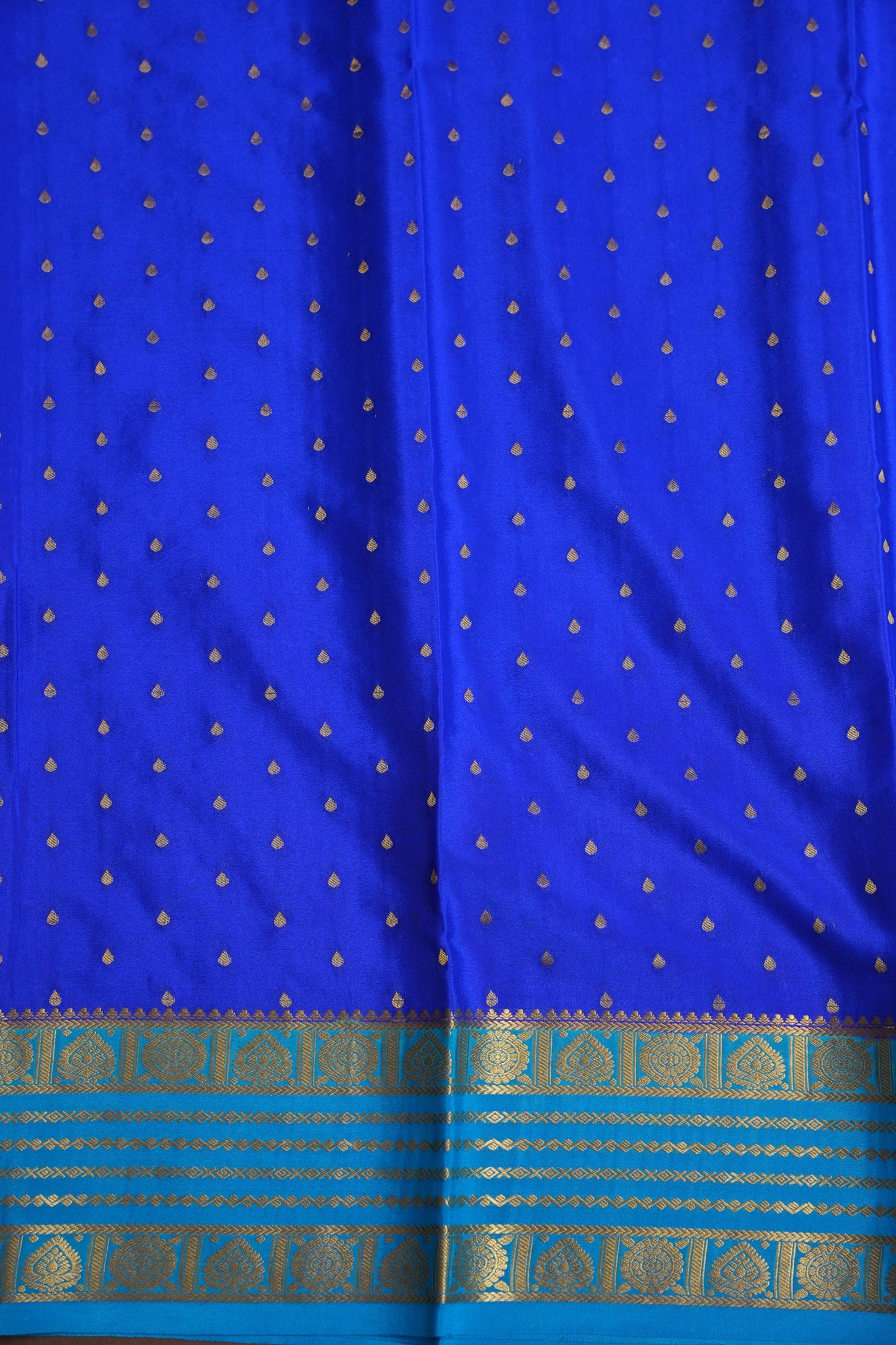 Pure Crepe Mysore Silk Saree in Ink Blue With Contrast Sky Blue Border