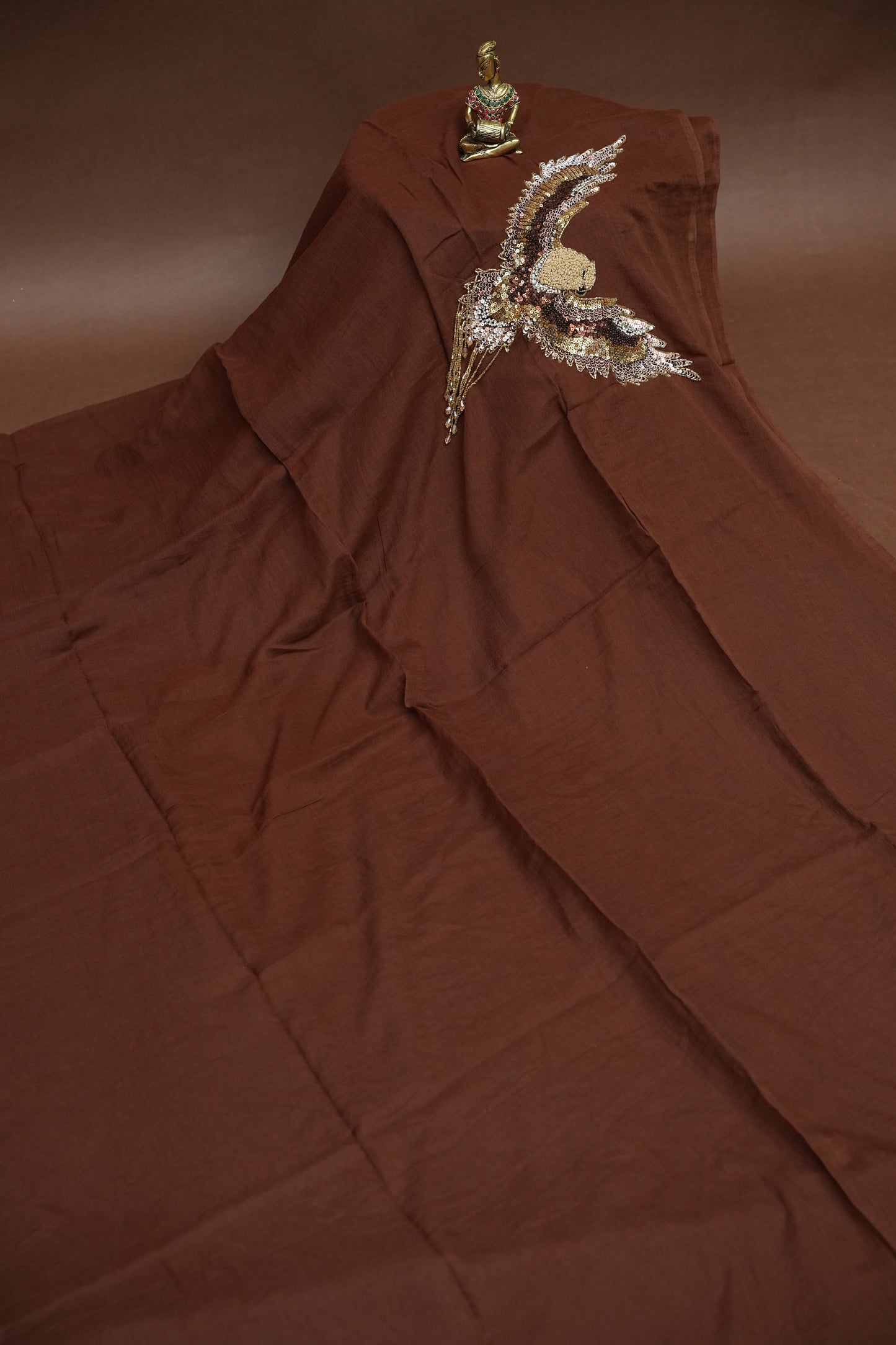 Chocolate Brown Mul Mul Cotton Party Wear Saree with Handcrafted Flying Eagle Embellishment