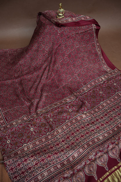 Pure Modal Silk Saree in Maroon with Bandhej-Inspired Ajrakh Print Pallu