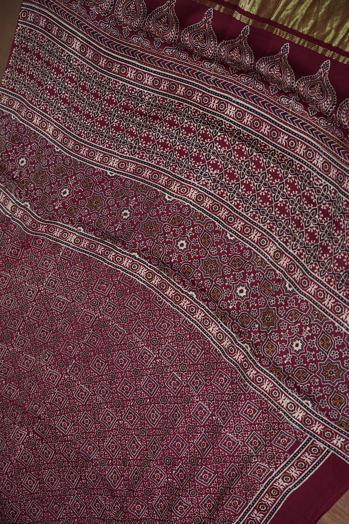 Pure Modal Silk Saree in Maroon with Bandhej-Inspired Ajrakh Print Pallu