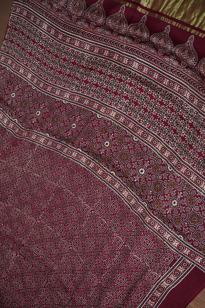 Pure Modal Silk Saree in Maroon with Bandhej-Inspired Ajrakh Print Pallu