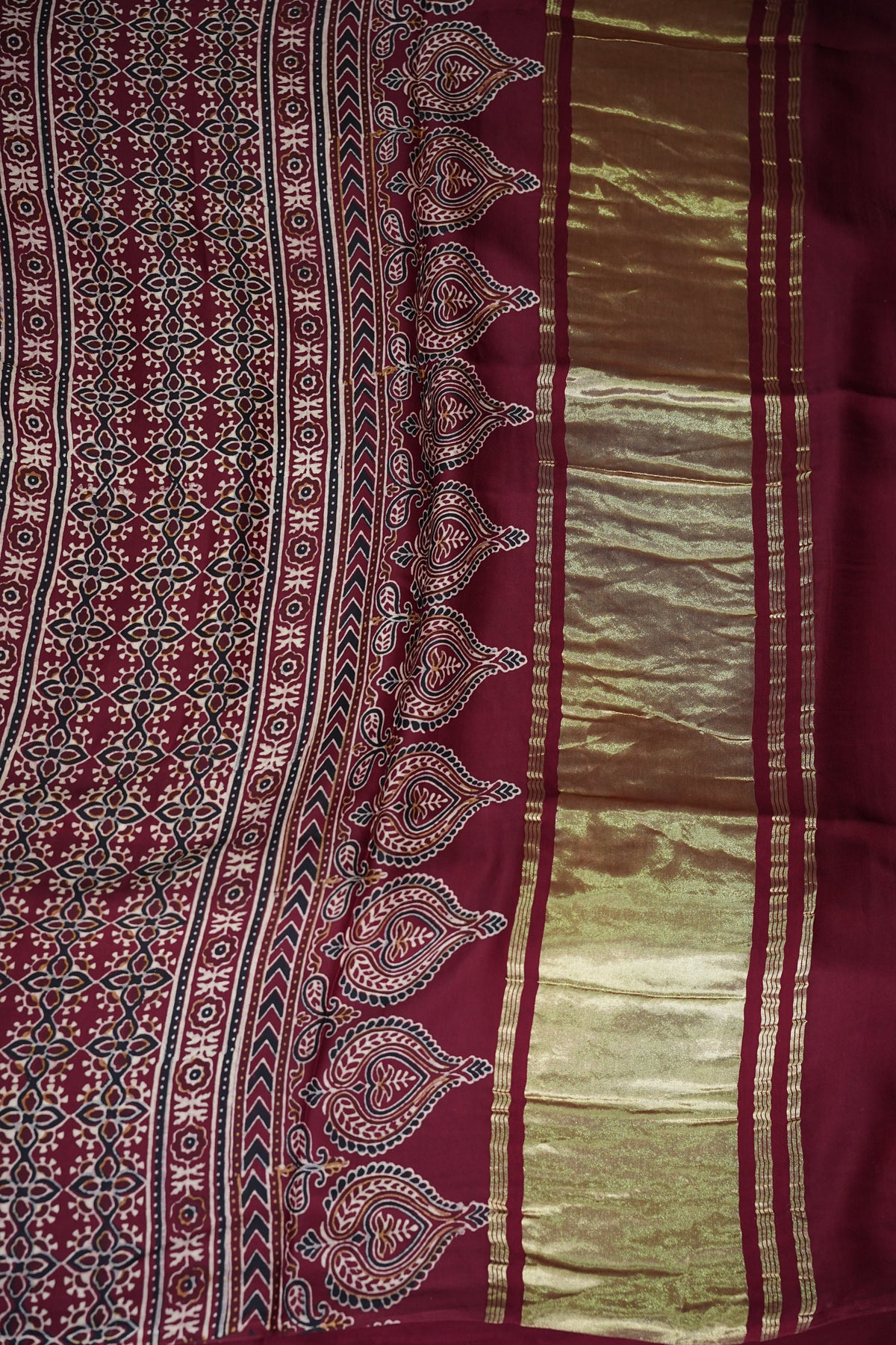 Pure Modal Silk Saree in Maroon with Bandhej-Inspired Ajrakh Print Pallu
